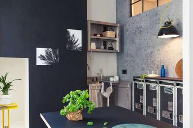 Berlin micro-apartment is given a modern makeover to maximize space