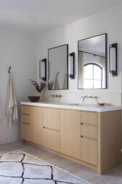 https://www.remodelista.com/ezoimgfmt/media.remodelista.com/wp-content/uploads/2016/04/Disc-Interiors-Silver-Lake-Home-Master-Bathroom-Remodelista-733x1101.jpg?ezimgfmt=rs:392x589/rscb4