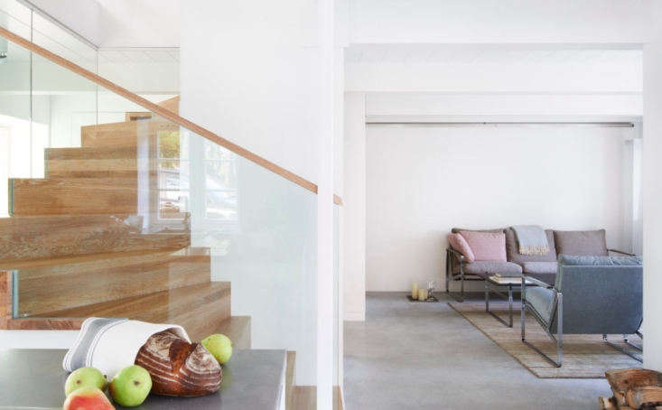 living room wood stairs rental house in germany