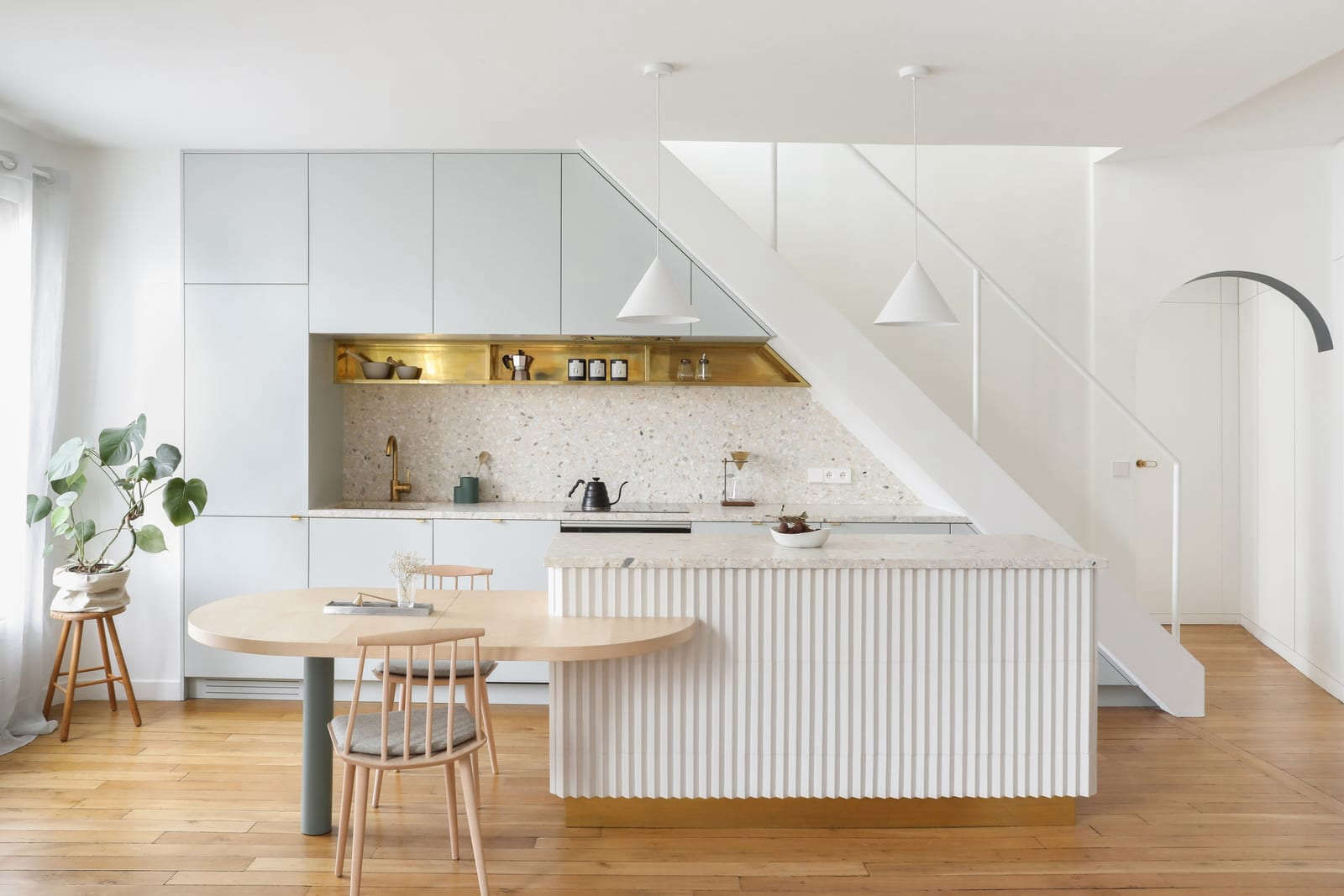 Fluted Architectural Detailing on Kitchen Islands and Wall Paneling