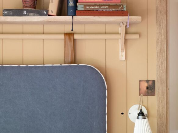 the quist small bedroom sliding headboard detail luke atkinson photo  