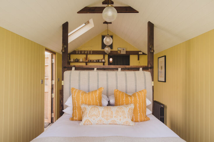 a holiday hut in yellow, as seen in an “all encompassing” stay at 18