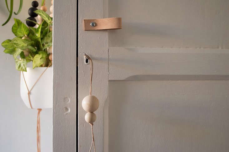 DIY:LeatherLaceandWoodenBallDoorPull-Remodelista