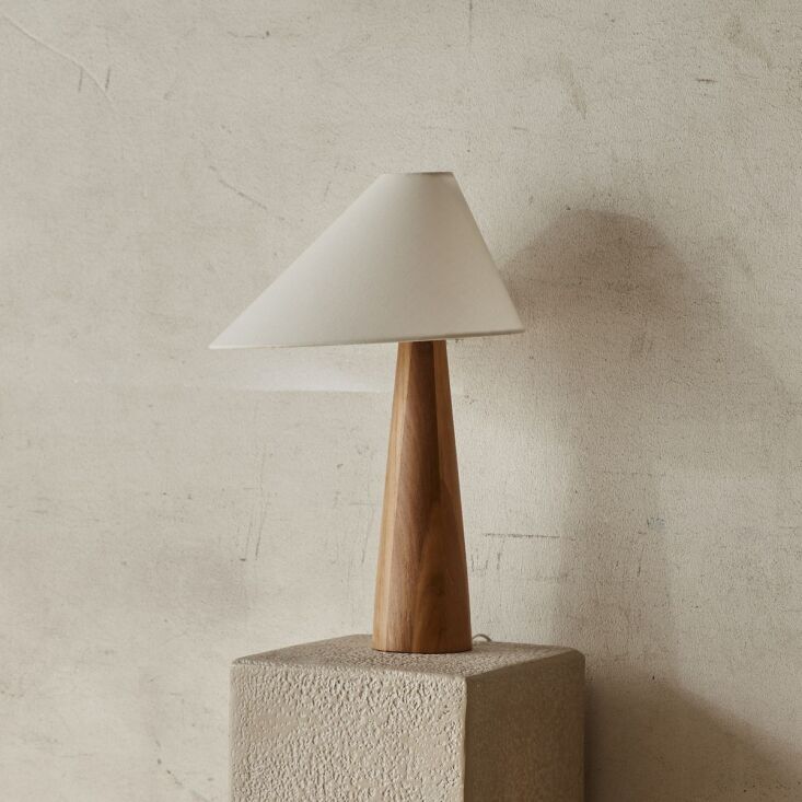 the alvin table lamp has a chunky solid teak base; it&#8217;s $449. 20