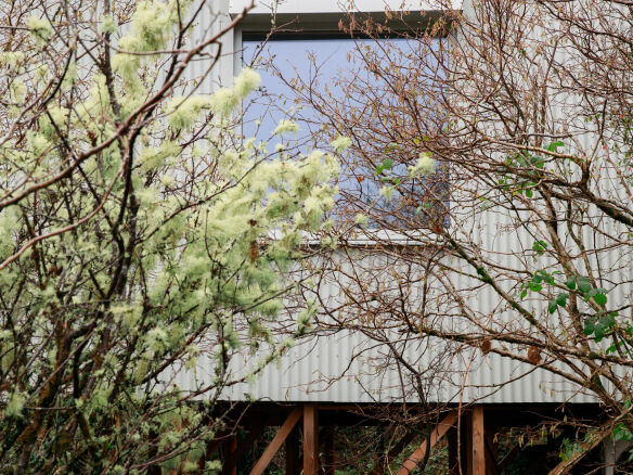 stilt house: a raised contemporary cabin on a lakeside farm retreat in connemar 9