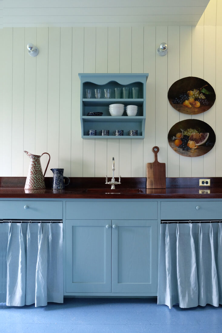 a blue on blue guest cottage kitchen. 30