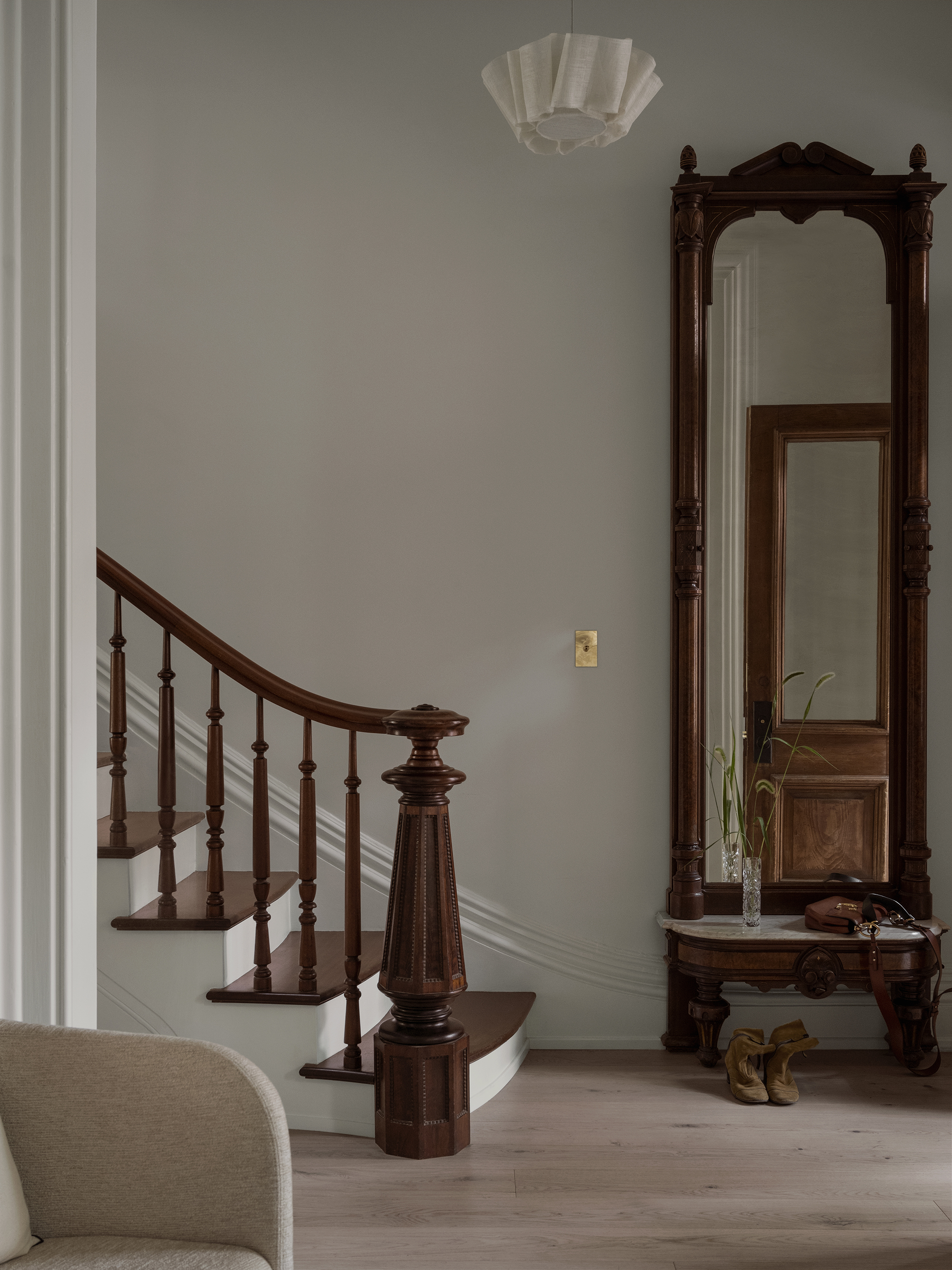 the front stair and mirror are restored originals. the pleated anders light is  29