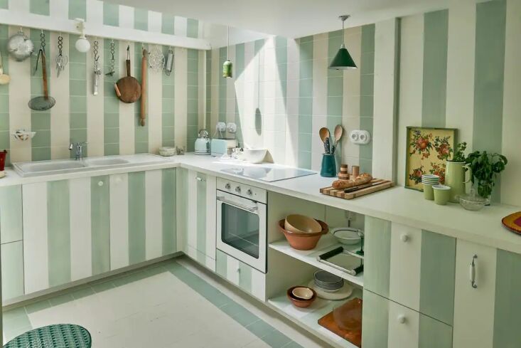 the striped kitchen is inspired by decorator and designer vincent darré. t 18