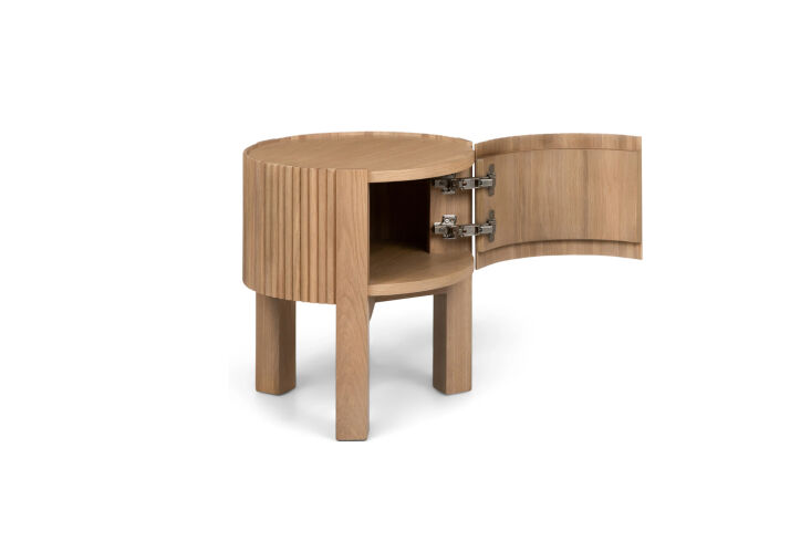 the article fortra side table has a fluted design with a door that opens to a w 22