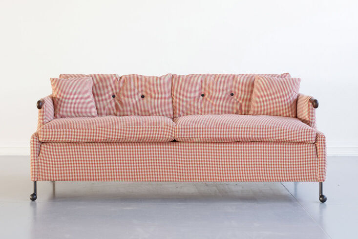 the bddw abel sofa has a douglas fir frame, cast bronze feet, and is available  27