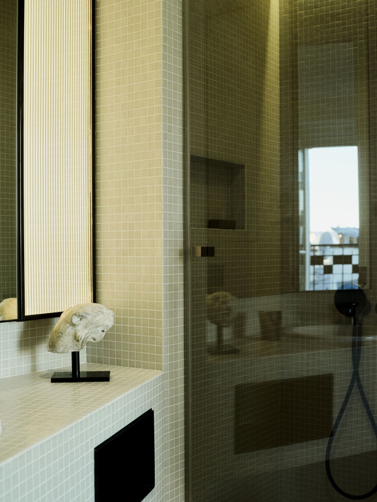 among the triptych mirror is a fluted glass screen diffusing light from an led  28