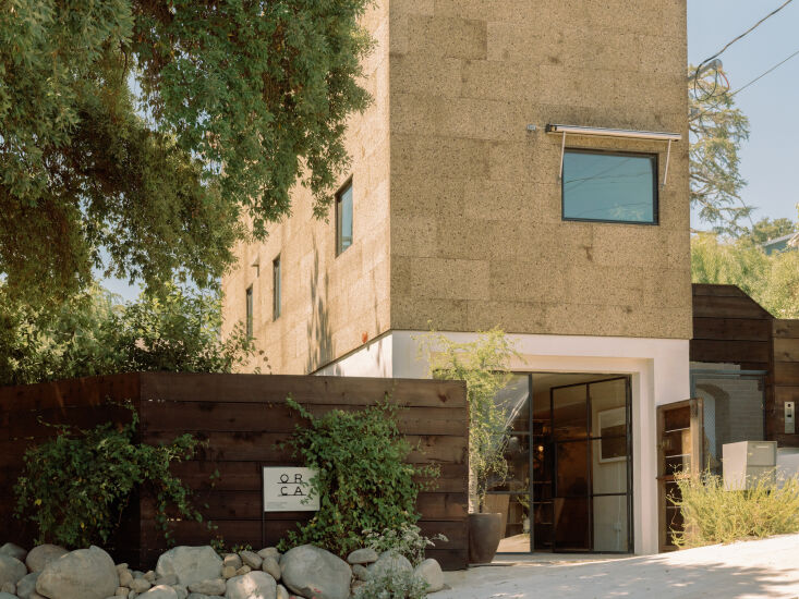 the exterior of the house is clad in \2 inch thick cork panels that also serve  17