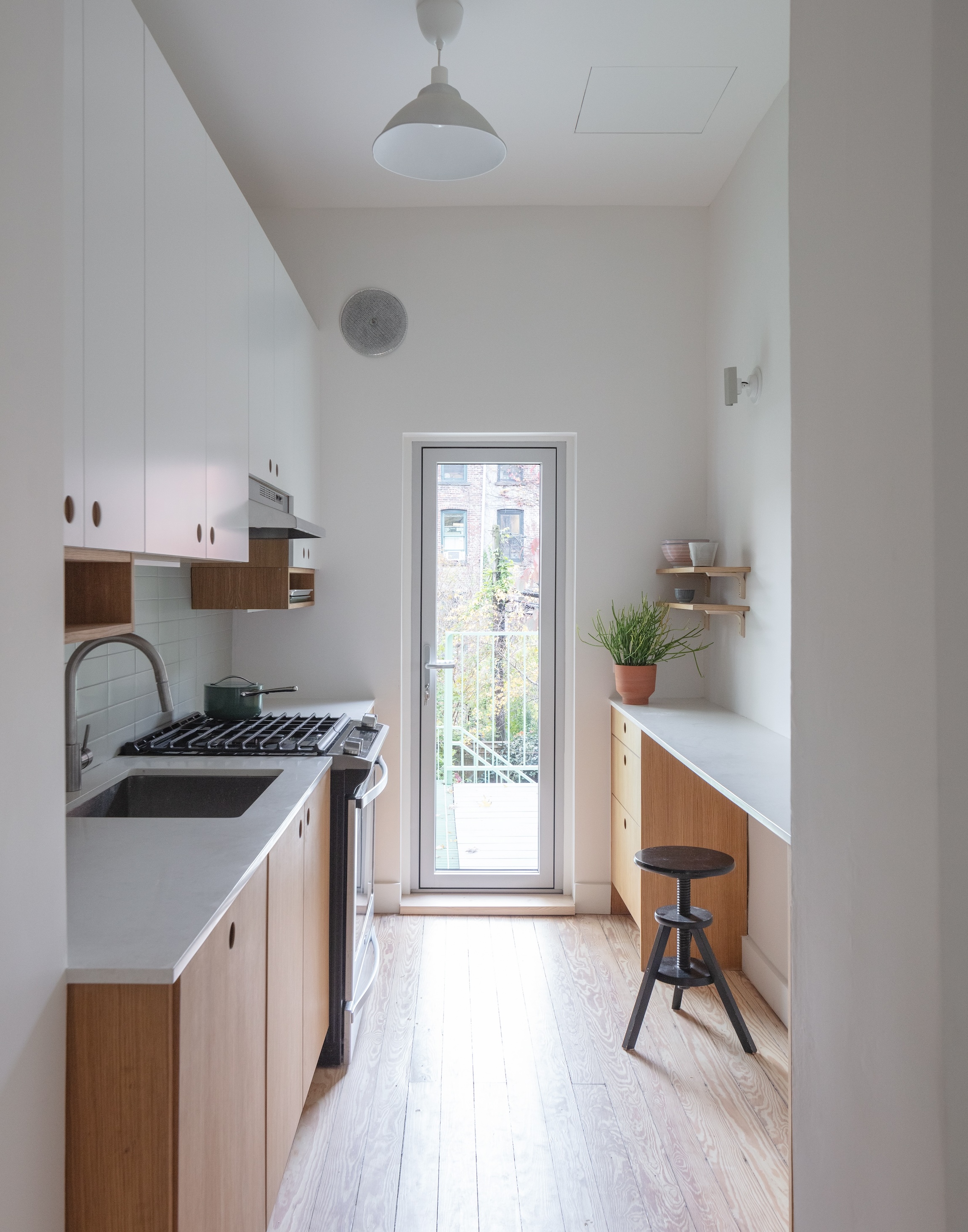 a new, streamlined kitchen is set in the extension and retains existing element 22