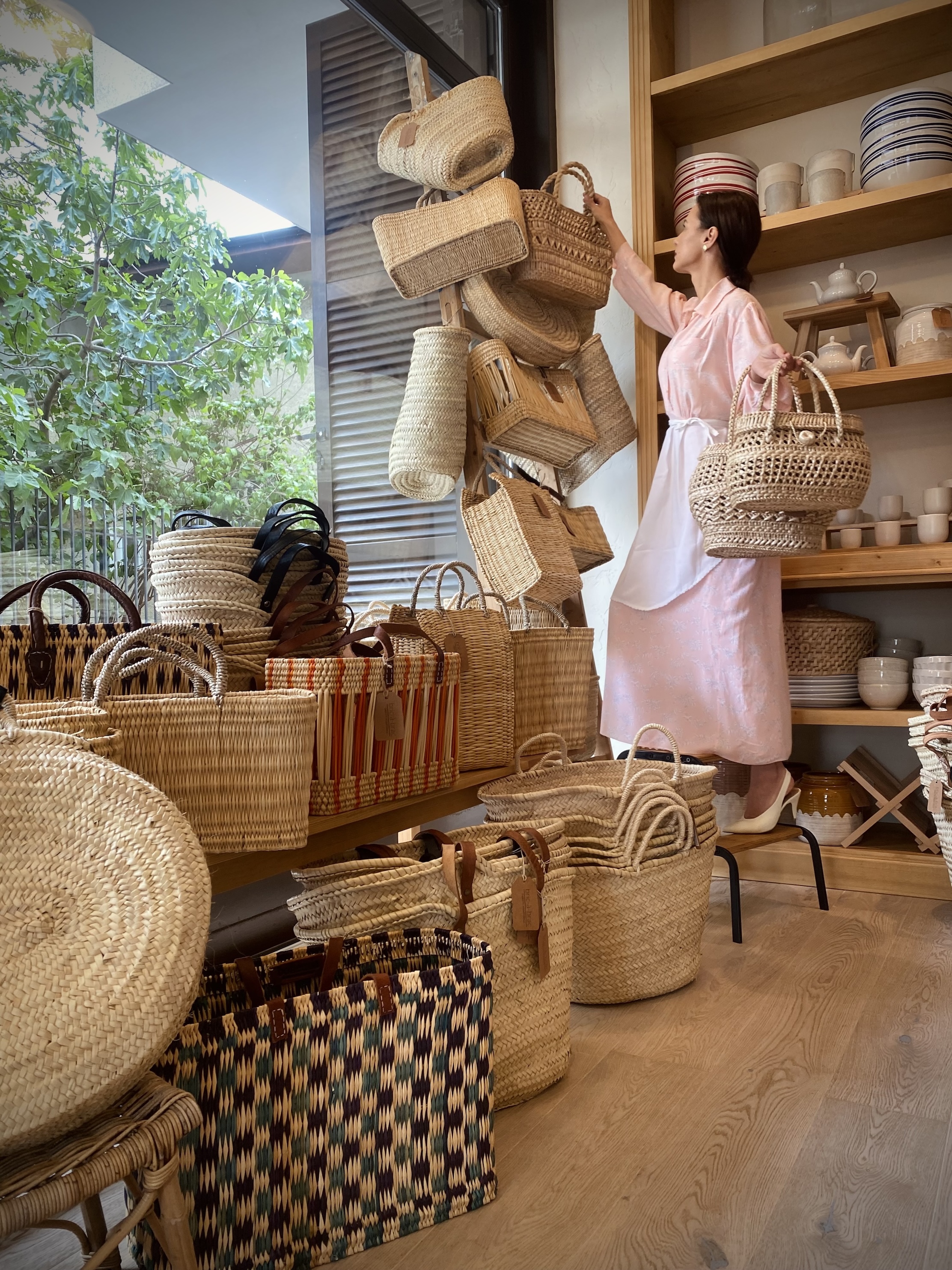 alexandra and her tiny team wear aprons and other vintage clothes from her coll 27