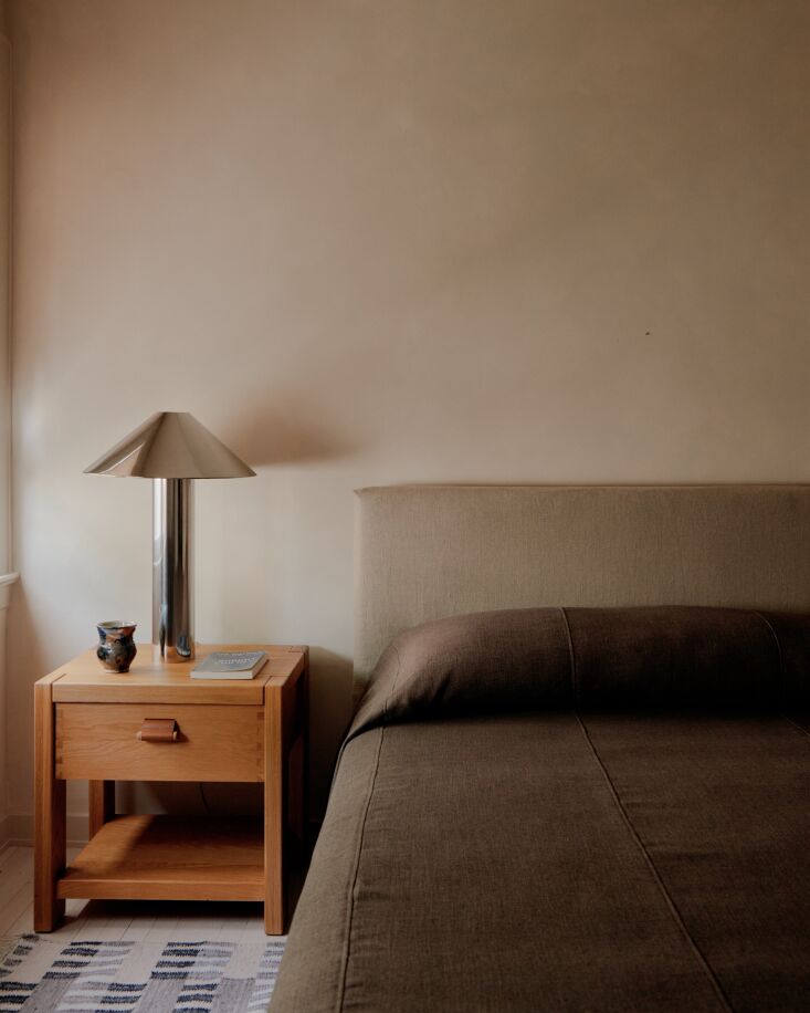 another guest room pairs organic materials with hyper modern chrome lamps. & 28