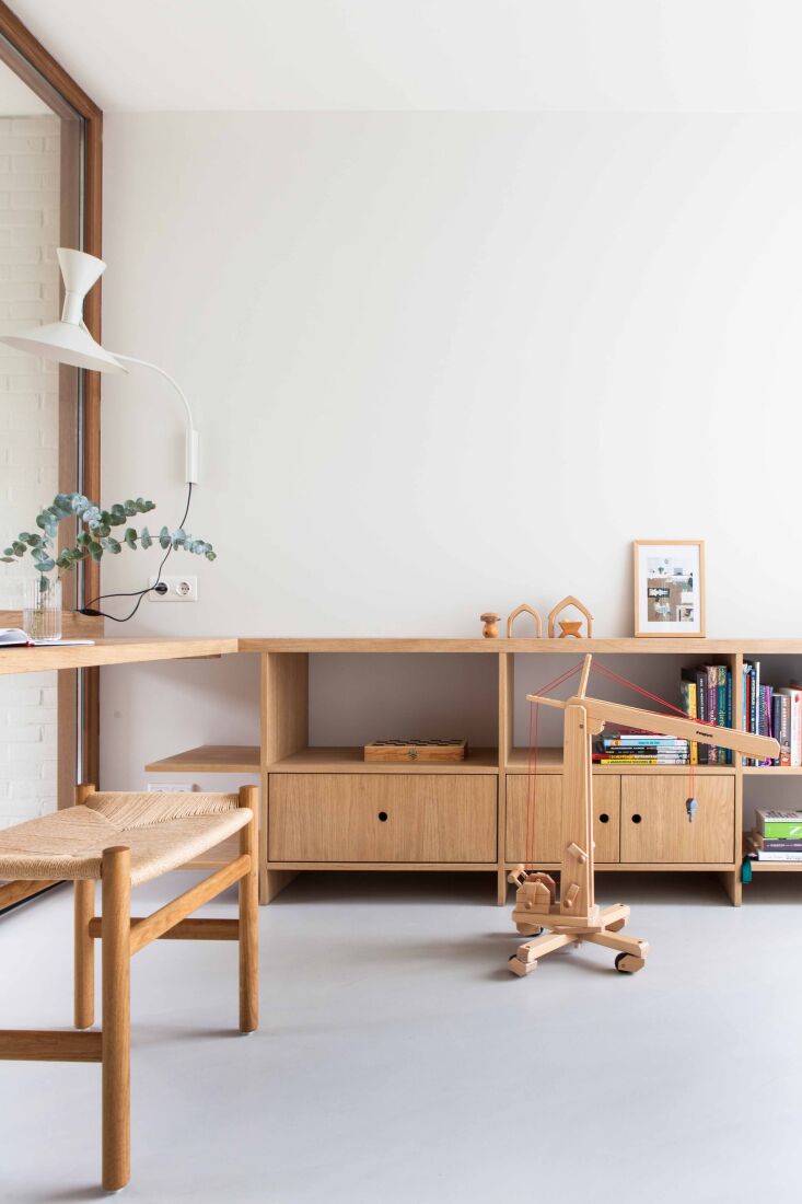 the office is also a place for children to read and play. the desk light is the 26