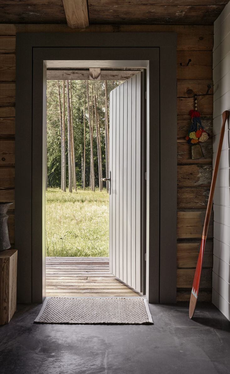 into the guest house in its new location, surrounded by meadows, woodlands, and 18