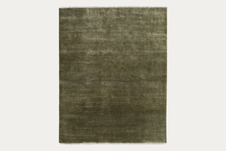 the armadillo agra rug in artichoke is made of a hand knotted deep cut pile in  25