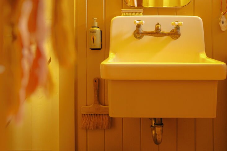 the sink is from watermark; beside it is a bottle of wonder valley hand soap. 29