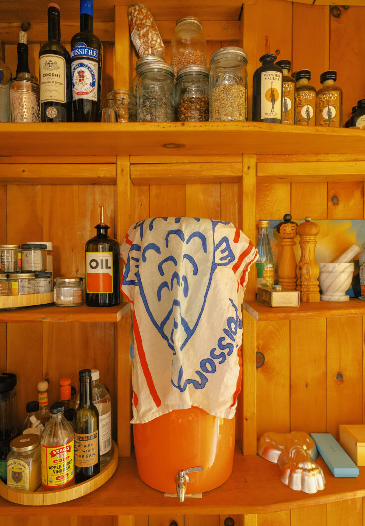 knotty pine in the pantry. &#8\2\20;the orange is a happy base for our very 22