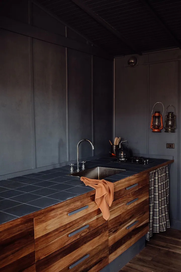 the custom kitchen, with orange and plaid accents. 21