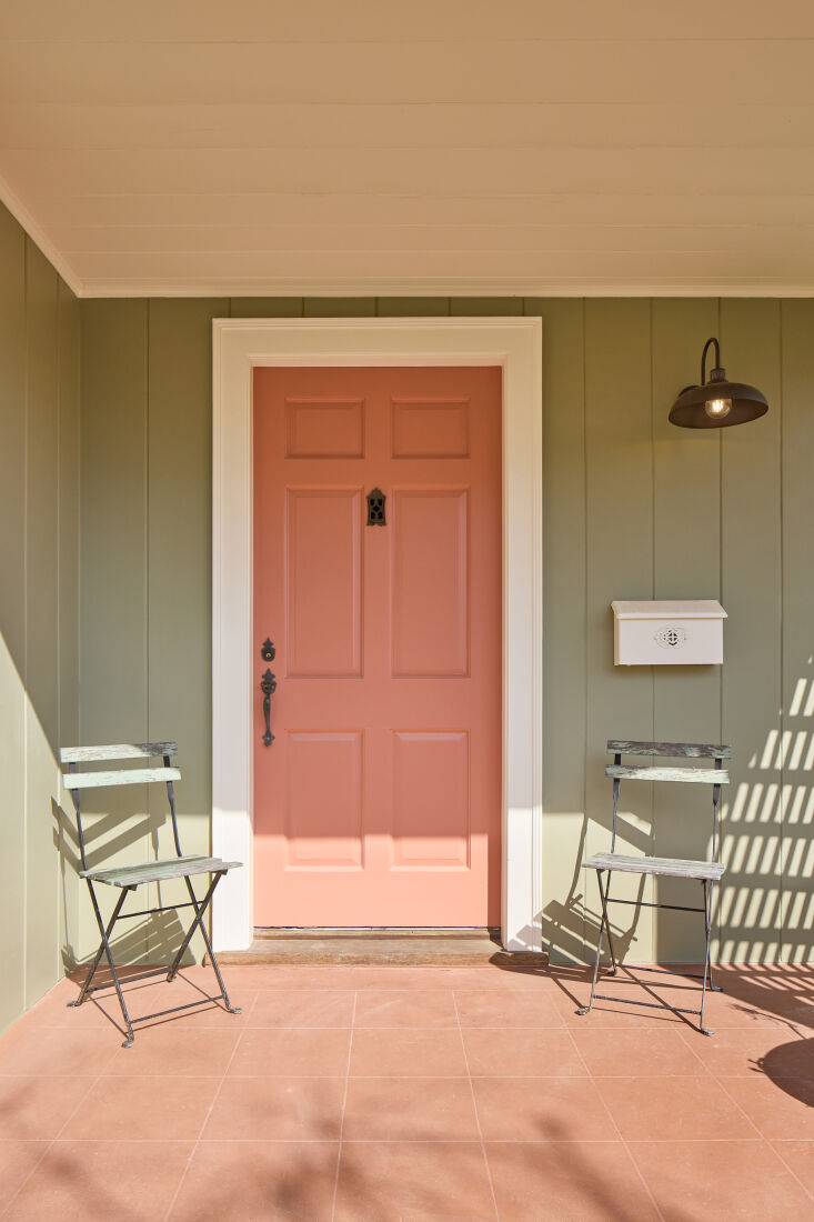 a contrast of soft green paint, a color original to the house, with a muted red 18