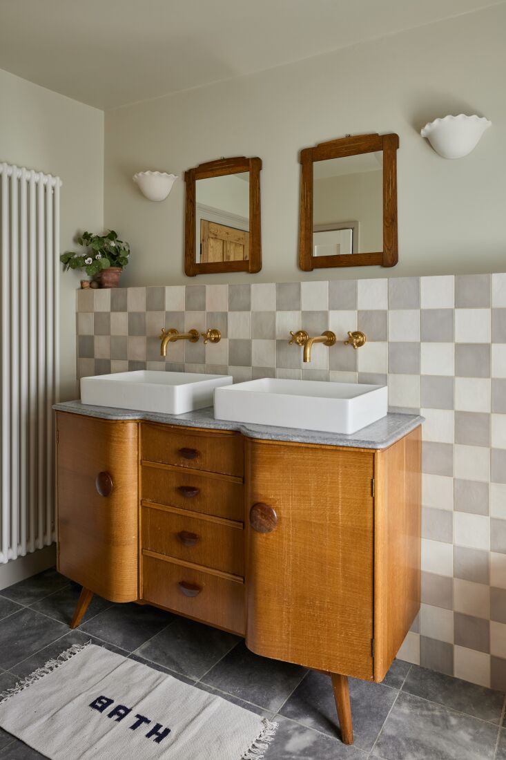 a mid century dresser becomes a vanity with a marble counter and two rectangula 26