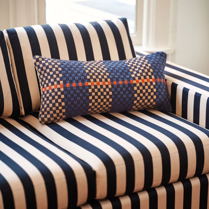 the andre lumbar pillow &#8\2\20;pairs bold checks and opposing colors with 21