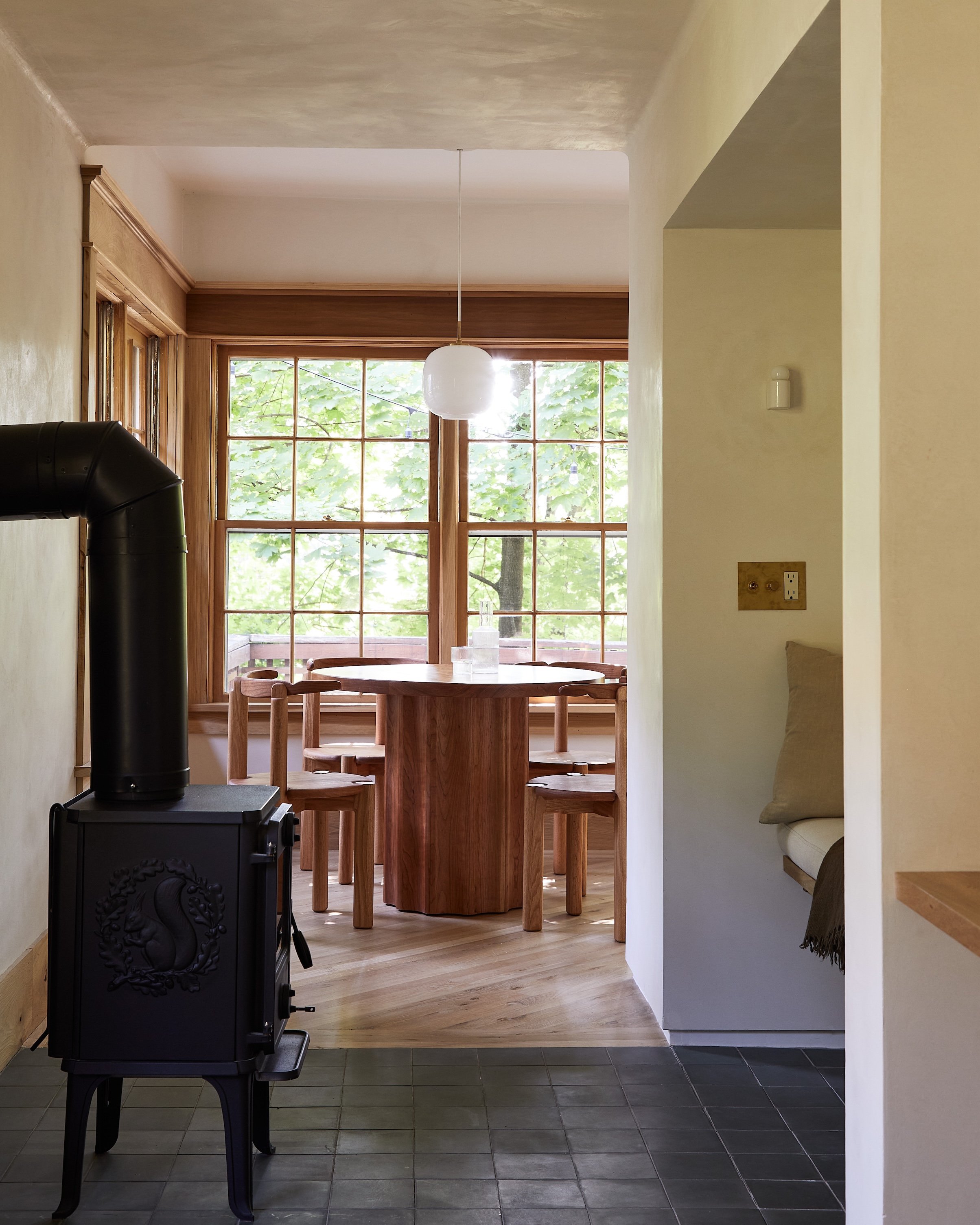 an inglenook with a morso stove occupies what had been a tiny bathroom in the t 28