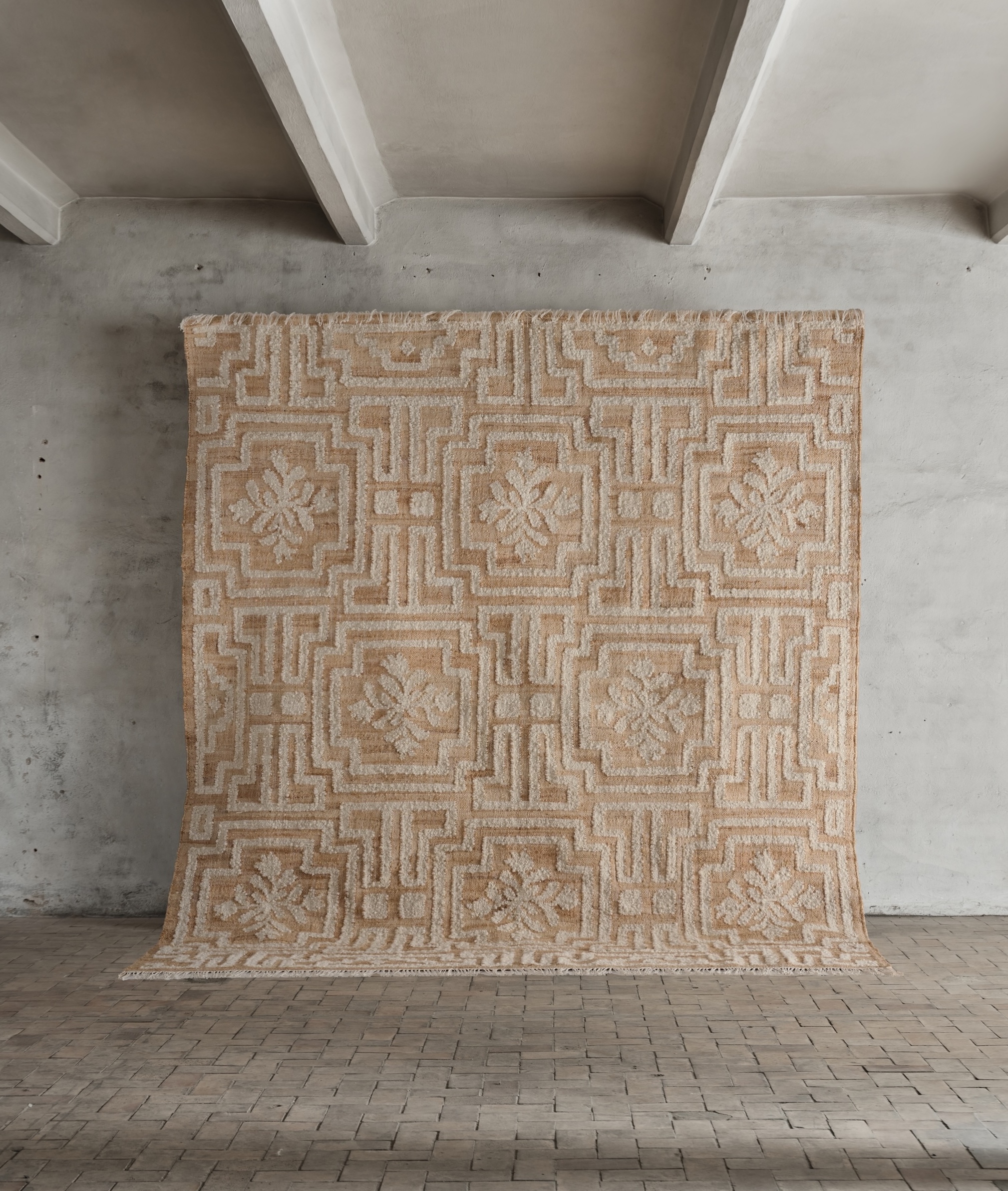 also just introduced: rug no. \2\2 is jute and wool in a graphic floral pattern 20