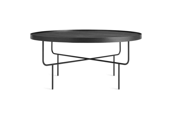 at lekker home, the roundhouse coffee table, shown in black, is \$5\20. 25