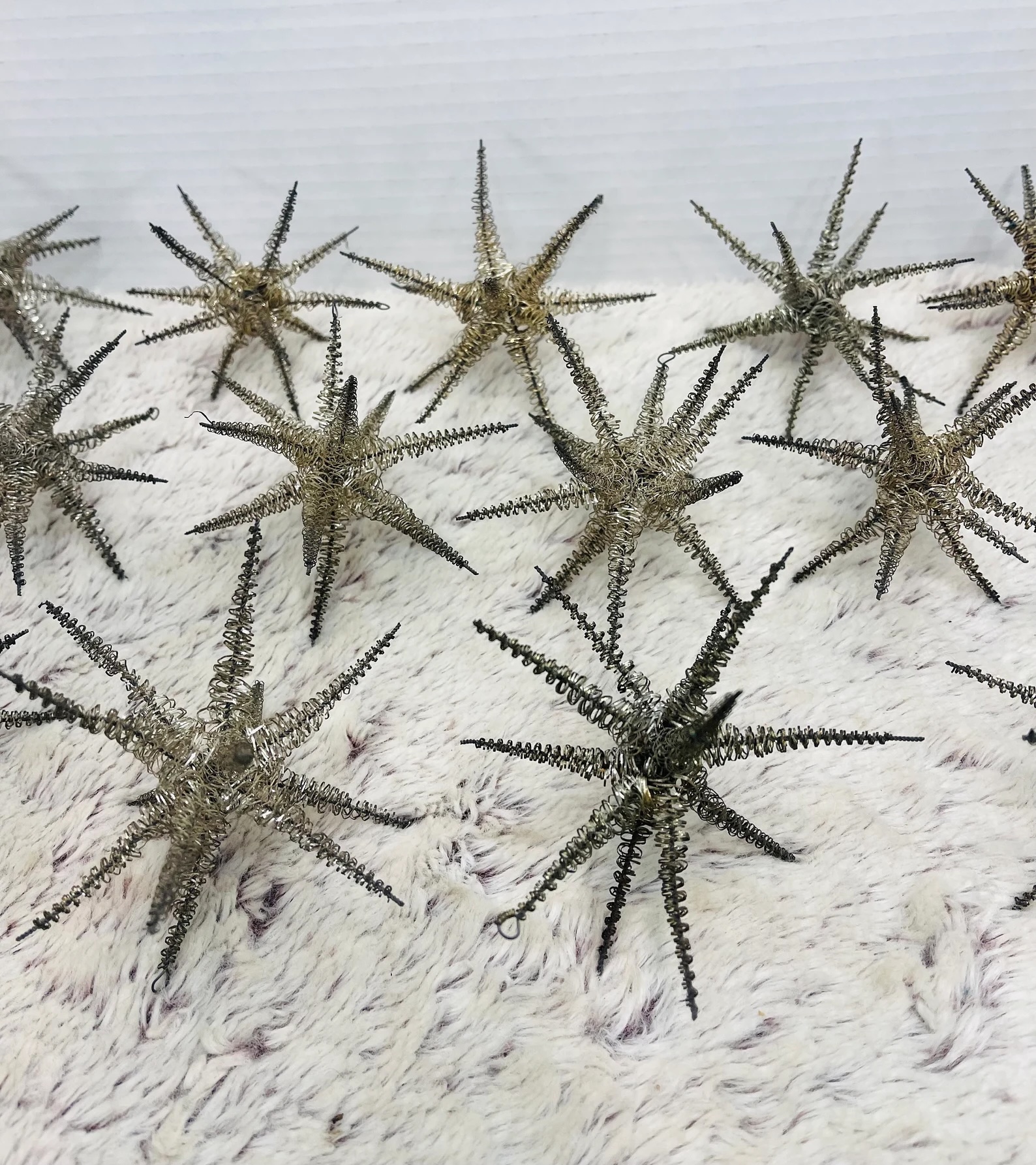 silver wire twelve point stars from the \1930s, likely made in germany, are \$\ 21