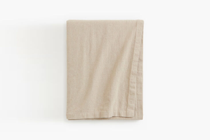 the washed linen tablecloth is, surprisingly, a budget find from h&m home.  20