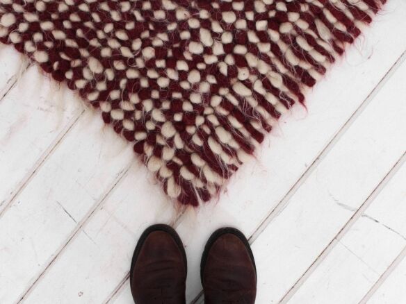 Now Admiring Wool Throw Rugs for Warmth Underfoot portrait 3