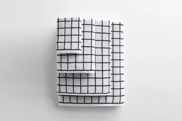 upgrade your bathroom with unison’s mini grid black and white towels. ma 21