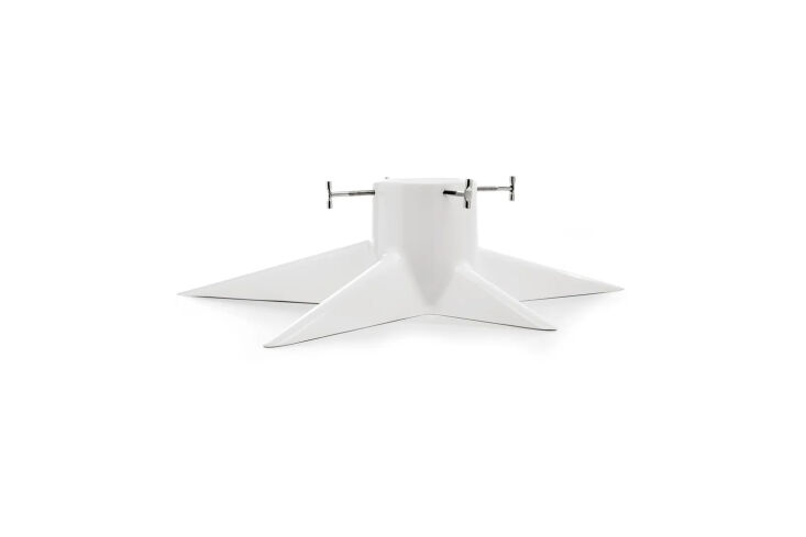 designed by pascal charmolu for born in sweden, the xmas tree holder white is \ 22