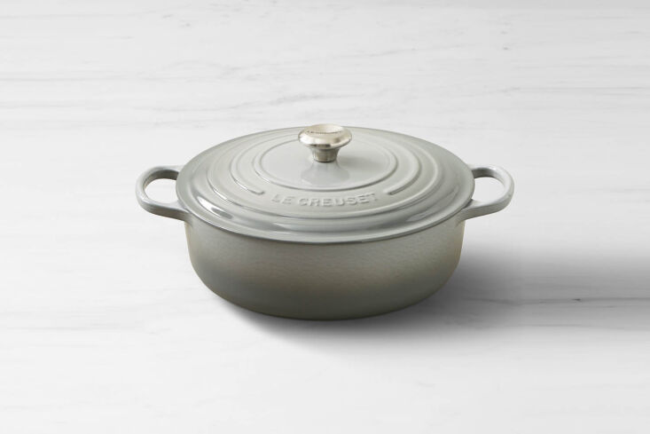 a classic go to, the le creuset signature enameled cast iron round wide dutch o 18