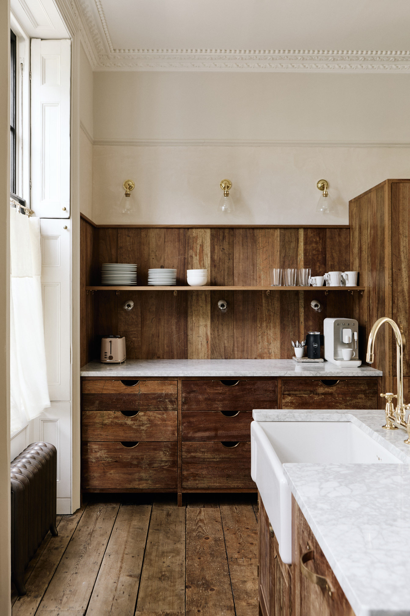 the drawers and cabinet doors are iroko wood salvaged from old lab tables, and  20