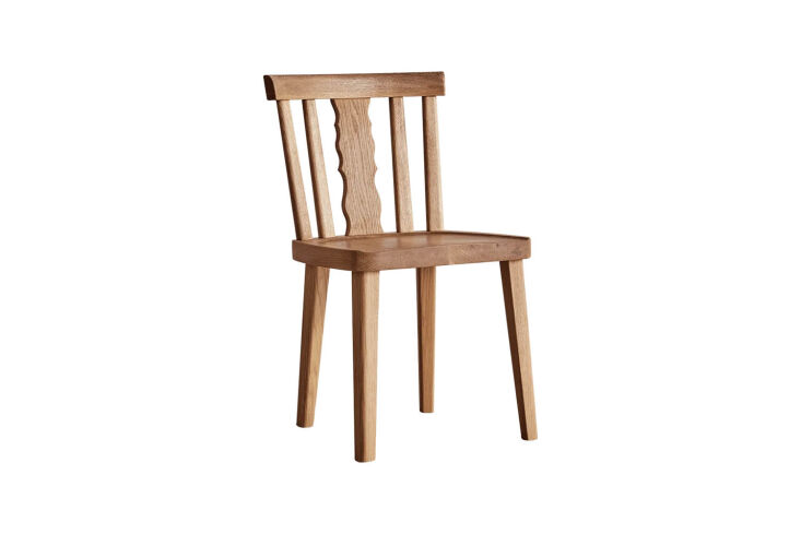 the nickey kehoe swiss back dining chair is handmade in solid oak; \$\2,\200 at 21