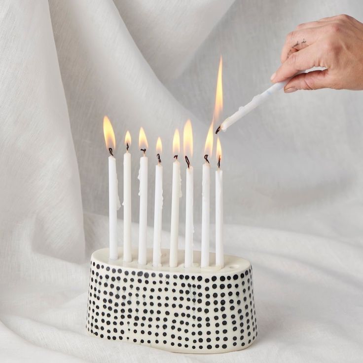 The Stria Dot Menorah is \$\2\20 from Lauren HB Studio of Lakewood, Ohio.