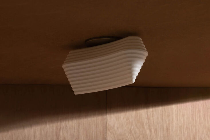 from humanhome.co, the marii flushmount light is made of engineered polymer for 19