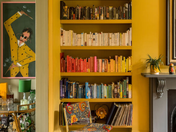 tonal terrace bvds architects french and tye colvestone crescent dalston hackney yellow books bookshelf greent timber floor fireplace grey cover  